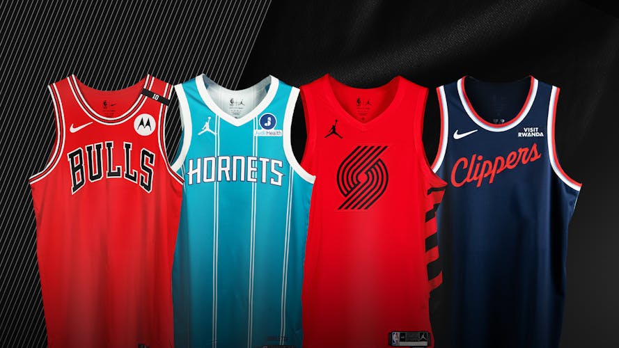 A photo of game-worn jerseys from the LA Clippers, Charlotte Hornets, Portland Trail Blazers, and Chicago Bulls