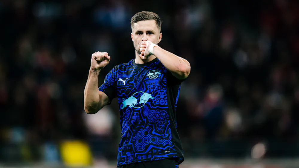 Christoph Baumgartner celebrating as he scores 2 goals against Borussia Dortmund