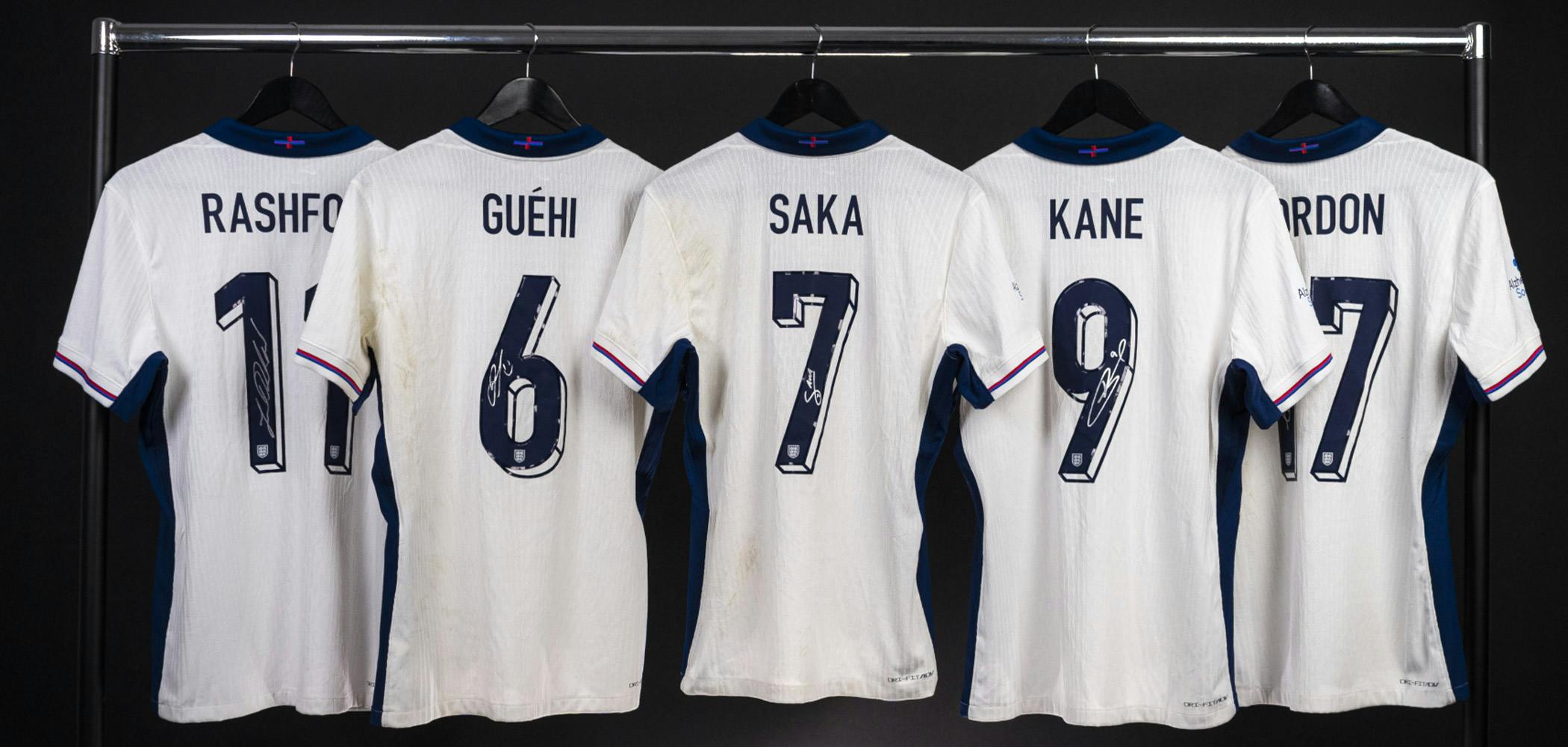 A row of England football shirts