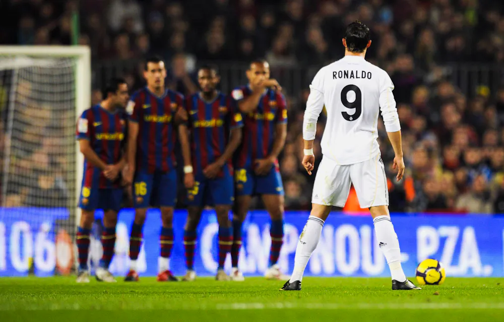 Ronaldo lines up a free-kick against Barcelona wearing number 9